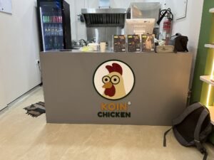 Koin Chicken acrylic counter logo panel