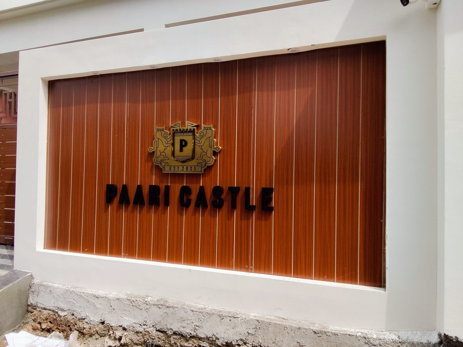 Paari Castle 3D metal letters on timber-clad wall