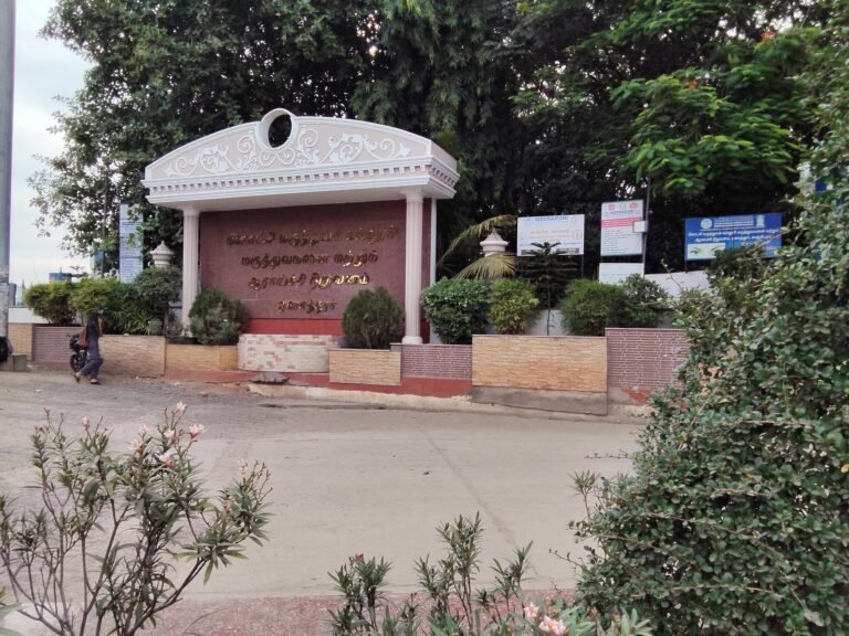 Decorative entrance arch signage with engraved lettering
