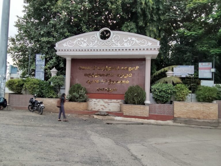 Entrance archway monument signage at campus gate