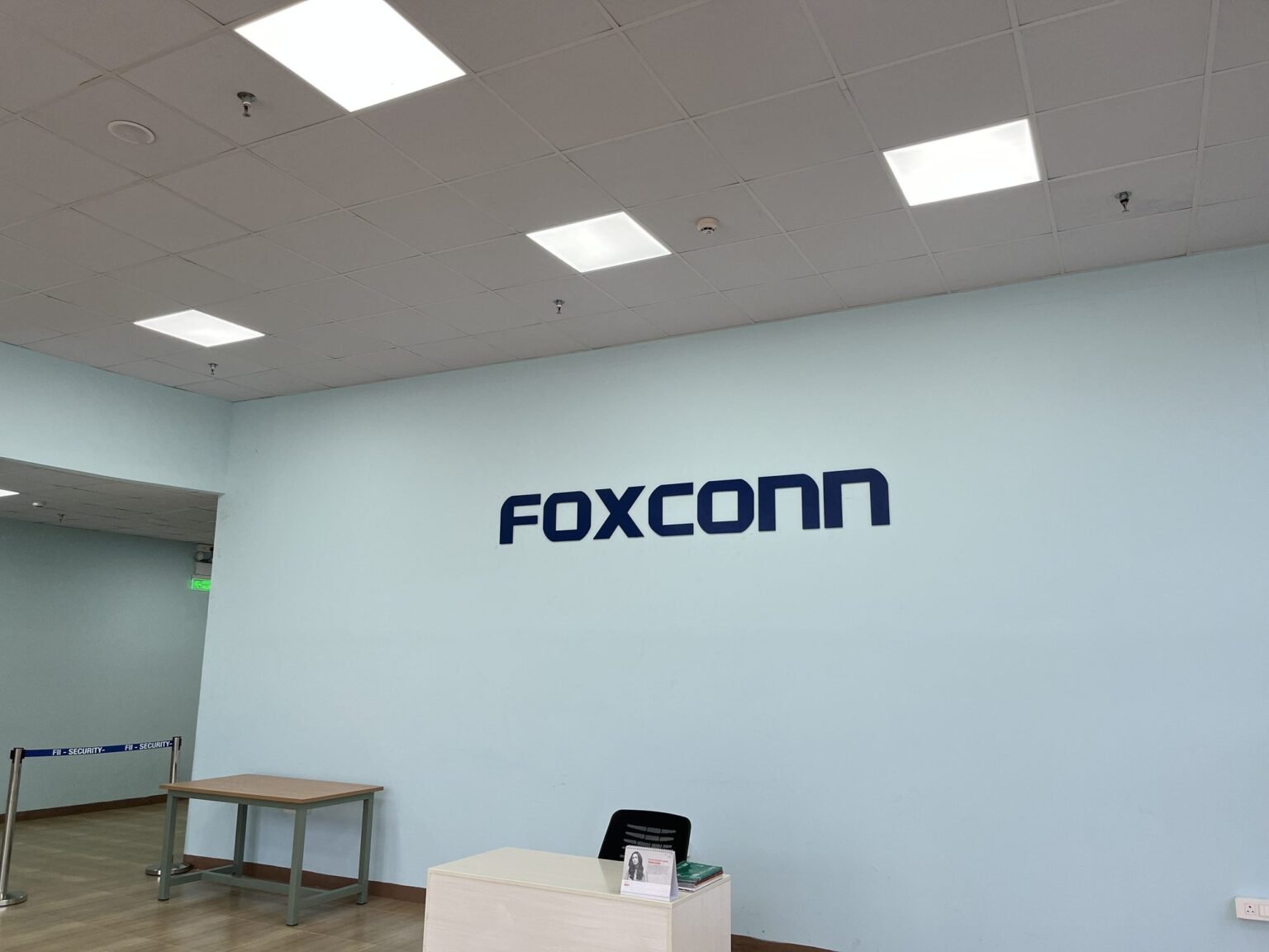 Foxconn reception wall lettering at the front desk