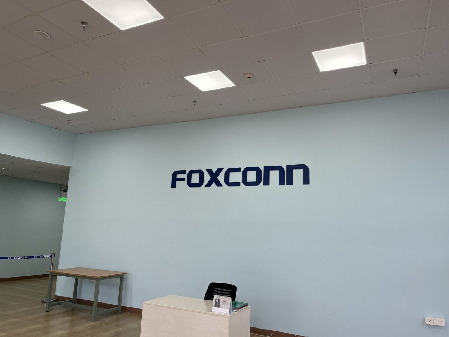 Foxconn reception wall lettering at the front desk