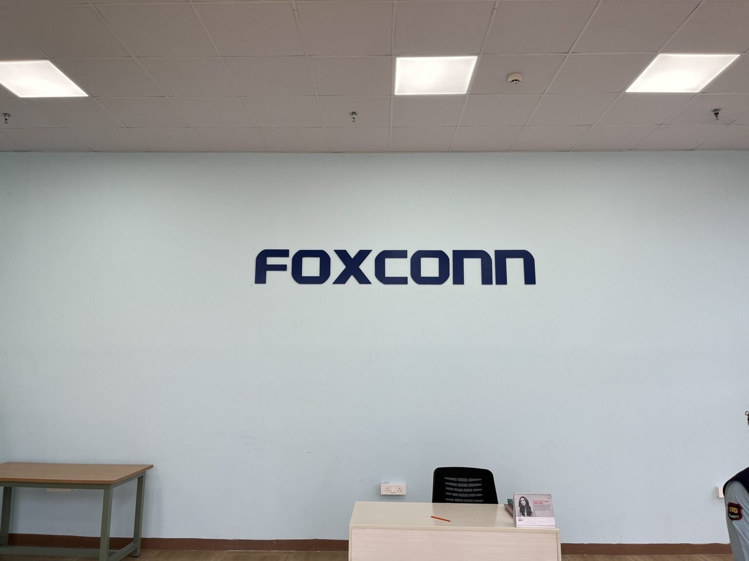 Foxconn reception wall lettering at the front desk