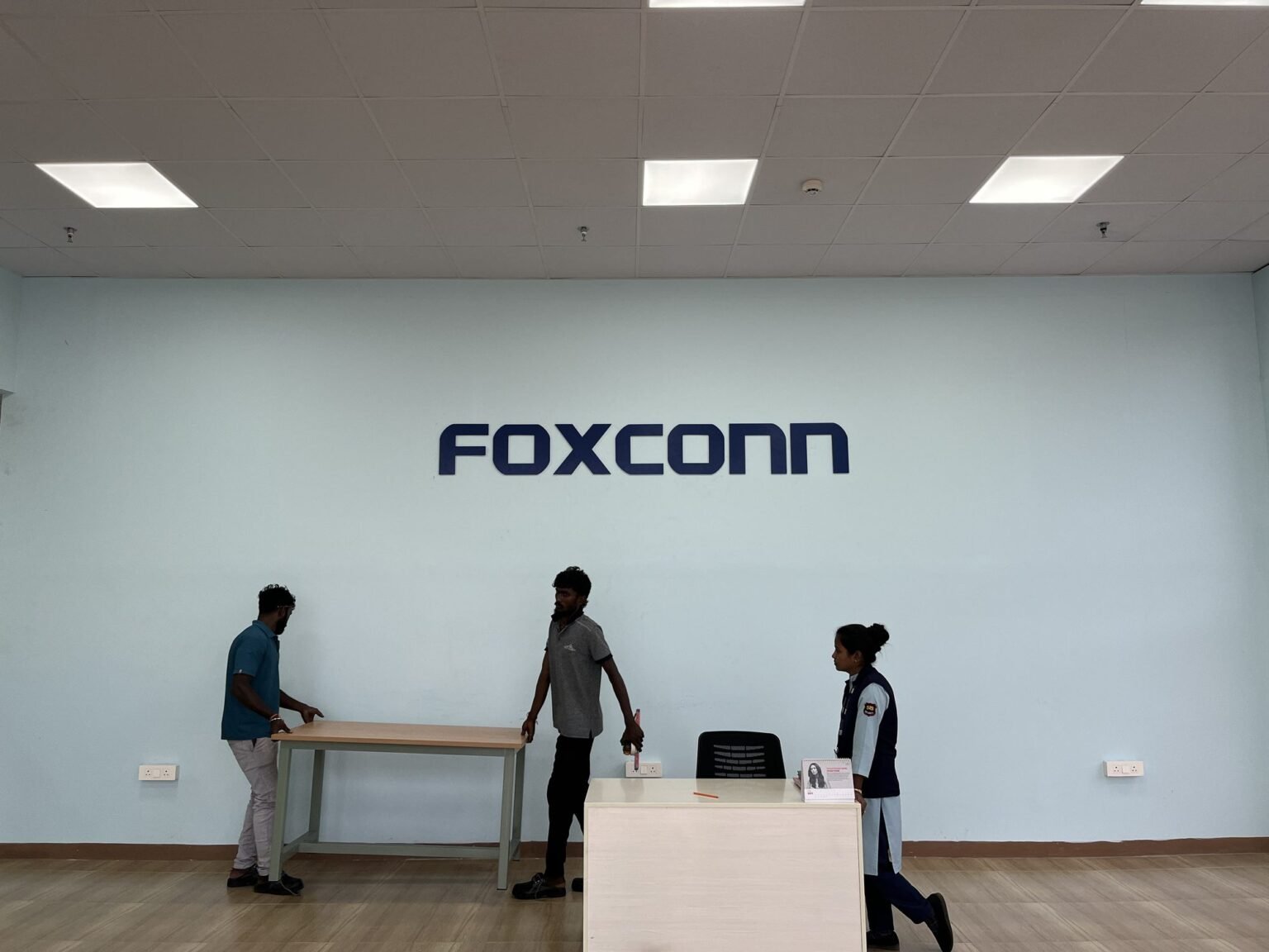 Foxconn reception wall lettering at the front desk