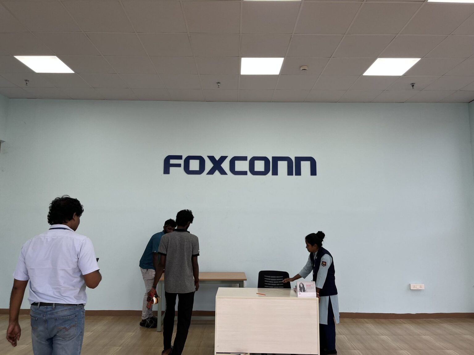 Foxconn reception wall lettering at the front desk