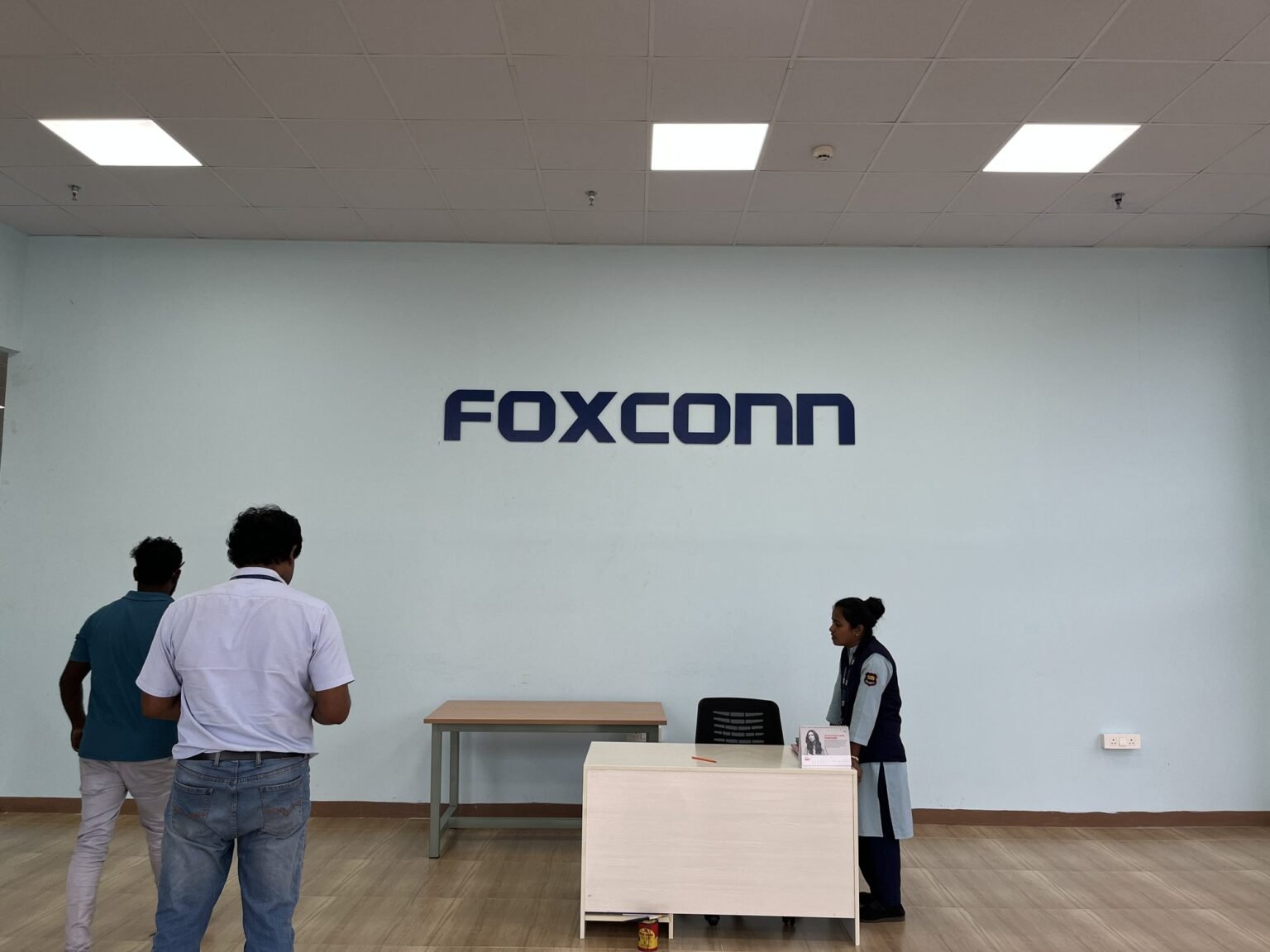 Foxconn reception wall lettering at the front desk
