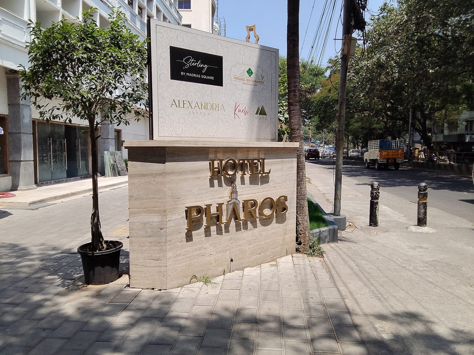 Hotel Pharoe metal letters on stone monolith sign