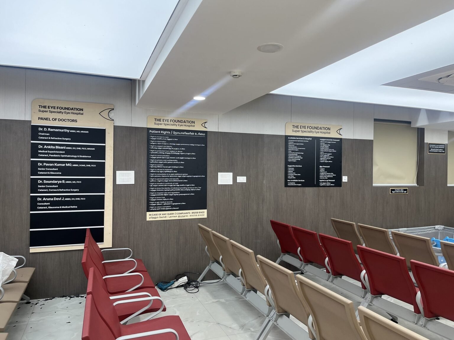 Directional wayfinding board in hospital corridor