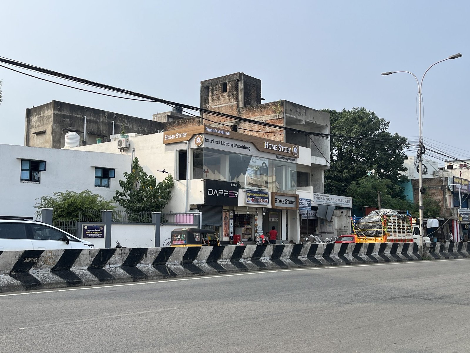 Home Story showroom trimcap signboard on building