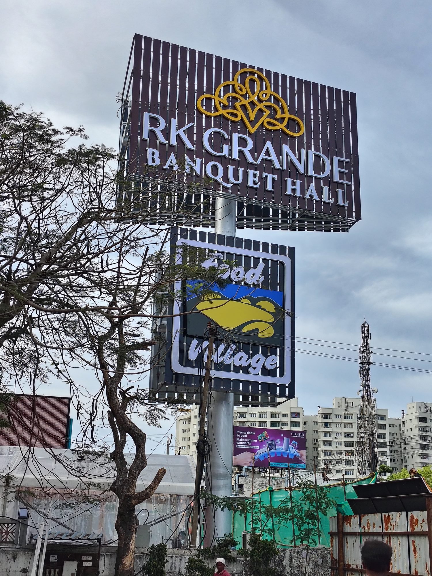 RK Grande Banquet Hall unipole sign against the skyline